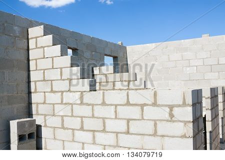 building of the house from a stone