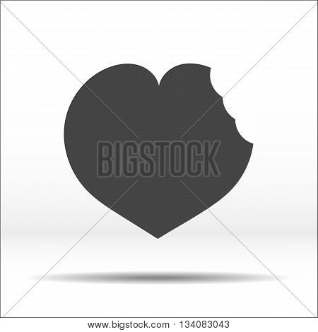 Grey heart with a bite mark on it. White-black illustration and icon.