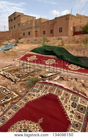MOROCCO - AUGUST 01: Traditional berber carpets drying in open air in Morocco August 01 2015. Morocco is one of the most popular tourist place in North Africa.