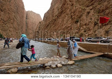 TODRA MOROCCO - AUGUST 02: Unidentified people in a canyon in Morocco August 02 2015. Todra Gorge is a canyon in the High Atlas Mountains in Morocco near the town of Tinerhir.