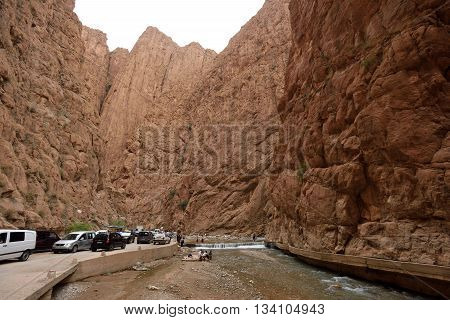 TODRA MOROCCO - AUGUST 02: Unidentified people in a canyon in Morocco August 02 2015. Todra Gorge is a canyon in the High Atlas Mountains in Morocco near the town of Tinerhir.