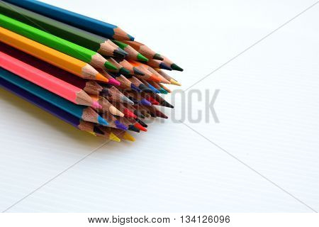 Stack of Color Pencils on white background