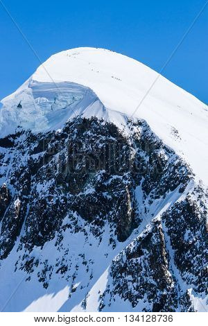Peak of the snowy mountain from Alps Swiss Alpine Alps mountain landscape and place for skiing at Matterhorn Switzerland