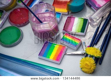 Tools: paint brushes liquid - Aqua make-up body art