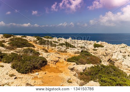Seascape with rocks shore of Mediterranean Sea. Coast of Cyprus Ayia Napa.