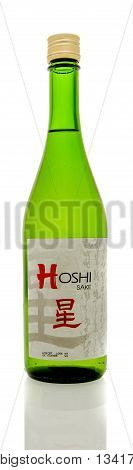 Winneconne WI - 8 June 2016: Bottle of Hoshi sake on an isolated background