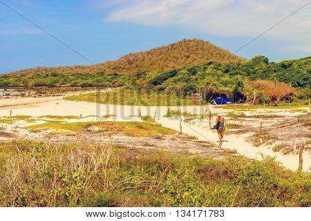 Santa Cruz Island Galapagos Ecuador - April 11 2016: Tourists visiting the el Garrapatero beach on Santa Cruz island