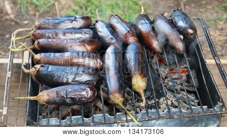 Eggplant fried on the grill at a picnic in the summer