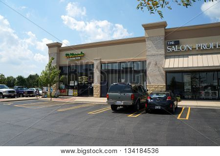 SHOREWOOD, ILLINOIS / UNITED STATES - AUGUST 16, 2015: El Mercado Mexican Market offers tacos al carbon, tortas, burritos, and other Mexican specialties, in a Shorewood strip mall.