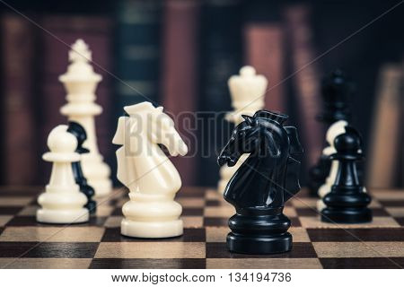 Chess piece on the board and dark background
