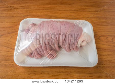 Fresh chitterlings on wood table