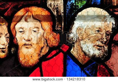 Triel sur Seine France - april 3 2016 : historical stained glass window in Saint Martin church