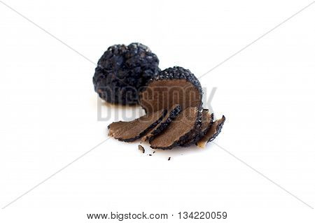 Black truffles isolated gourmet food (shallow depth of field)