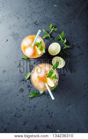 Peach Aqua Fresca with Lime Juice and Mint Leaves