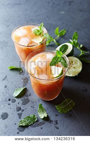 Peach Aqua Fresca with Lime Juice and Mint Leaves