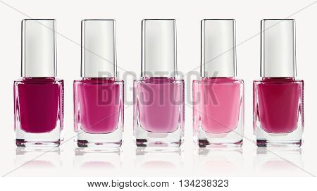 Set of colorful nail polish isolated on white
