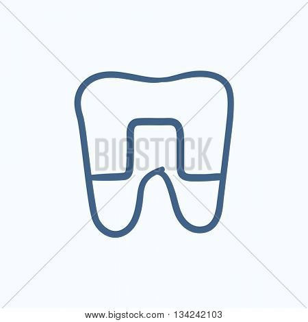 Crowned tooth vector sketch icon isolated on background. Hand drawn Crowned tooth icon. Crowned tooth sketch icon for infographic, website or app.