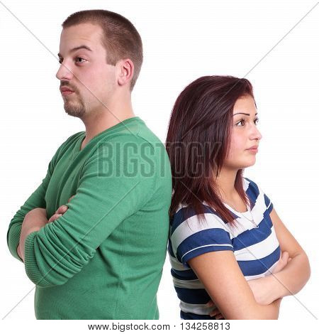 young couple sulking after an argument, isolated on white