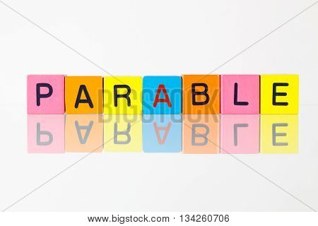 Parable - an inscription from children's wooden blocks