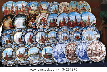MOSCOW, RUSSIA - MAY 7, 2016: Painted colorful souvenir plates with the symbol of the Moscow