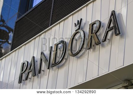 MADRID. SPAIN - MARCH 17. 2016: The sign for a Pandora jewellery store in Madrid Spain. Pandora is an international Danish jewelry manufacturer and retailer founded in 1982.