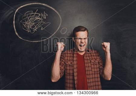 Young Man With Mess In Head Yelling And Screaming