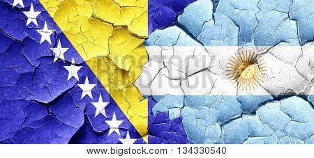 Bosnia and Herzegovina flag with Argentine flag on a grunge crac