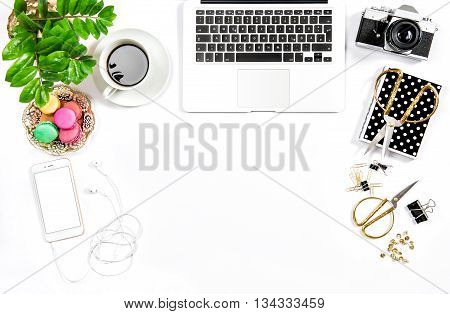 Business still life. Feminine home office desk. Coffee and colorful macaroon cookies. Flat lay. Hero header for social media