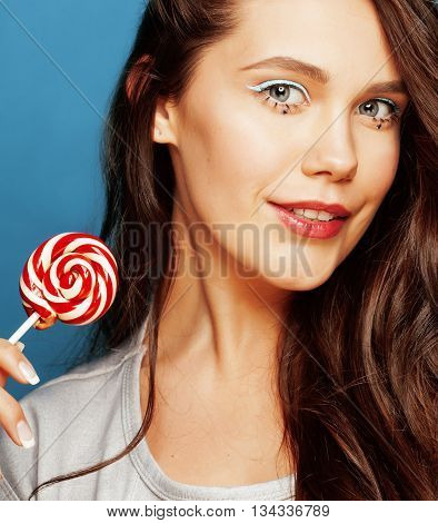 young pretty adorable woman with candy close up like doll makeup