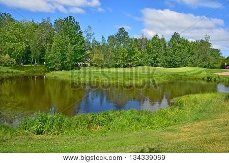 BROMONT QUEBEC CANADA 06 14 2016: Designed in 1992 by famous Graham Cooke, The Royal Bromont Golf Club offers an exceptional view of the surrounding mountains right in the heart of the City of Bromont