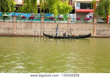 Eskisehir, Turkey - May 29,, 2016 : Gondolas are sailing in the Porsuk River, Eskisehir.