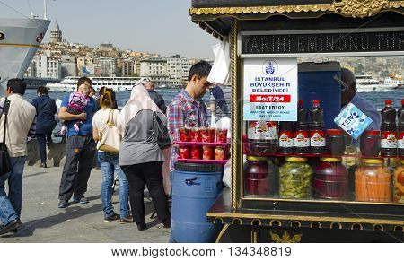 Istanbul Turkey - April 6 2013: Istanbul Eminonu pickle vendor. Traditional Turkish pickles of various fruits and vegetables. There is an important place in Turkey and produced first by the Turks.