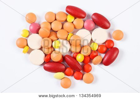 Colorful Medical Tablets And Capsules On White Background, Health Care Concept