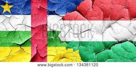 Central african republic flag with Hungary flag on a grunge crac