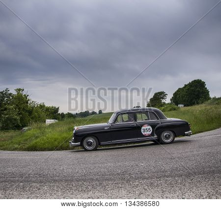 ITALY MILLE MIGLIA 2015  PESARO, ITALY - MAY 15:  MERCEDES-BENZ 220 A 1955  on an old racing car in rally Mille Miglia 2015 the famous italian historical race (1927-1957) on May 2015