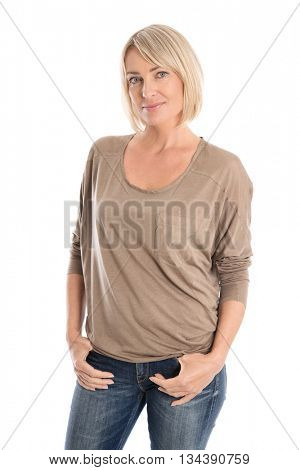 Slim nice smiling older woman isolated over white wearing jeans in portrait.