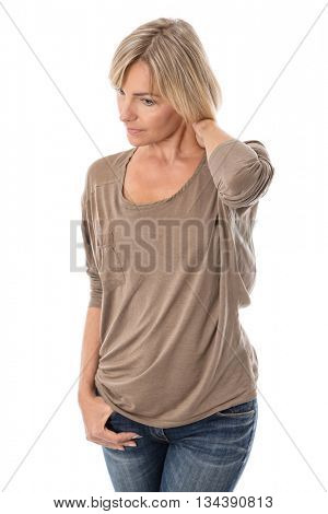 Thoughtful and sad isolated middle aged woman over white background in portrait.