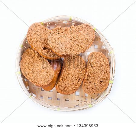 Bread In A Wicker Breadbasket On White Background