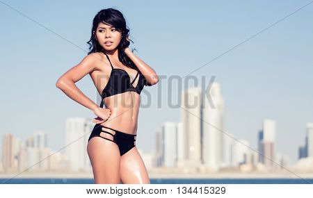 Sexy tourist girl in Dubai city beach
