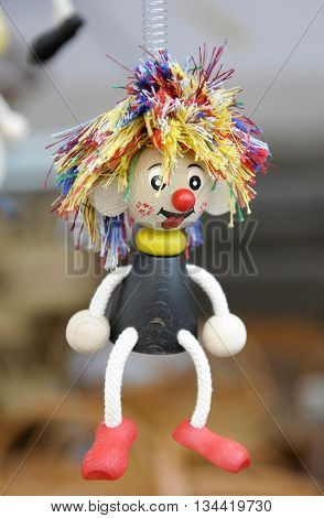 Doll hanging from a spring, Cakovec - Croatia.
