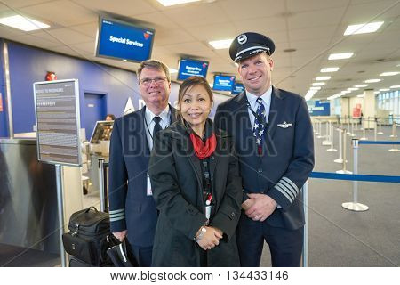 NEW YORK - MARCH 14, 2016: aircrew in JFK airport. John F. Kennedy International Airport is a major international airport located in the Queens borough of New York City, United States
