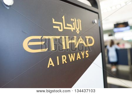 HONG KONG - MAY 12, 2016: design of Etihad check in counters at Terminal 1 of Hong Kong Airport. Etihad Airways is a flag carrier and the second-largest airline of the United Arab Emirates.