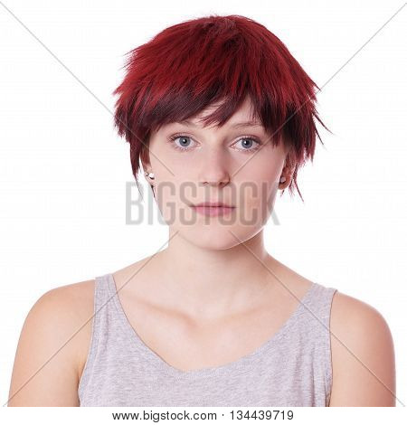 young woman with boyish short hair cut and neutral expression