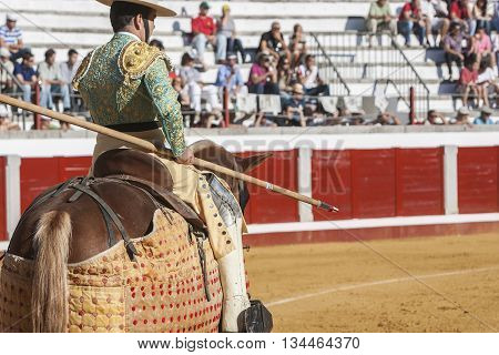 Pozoblanco Spain - September 24 2011: Picador bullfighter lancer whose job it is to weaken bull's neck muscles in the bullring for Jaen Spain