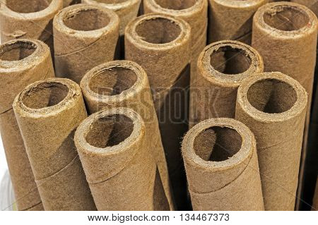 Verticaly Stacked  Collection Of Cardboard Packaging Tubes