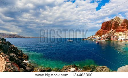 Panorama of Old port Ammoudi of Oia village at Santorini island in Aegean sea, Greece