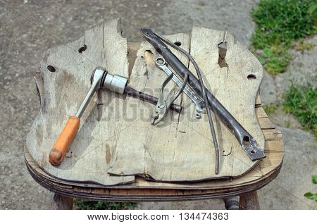 Repair tools and objects on the chair