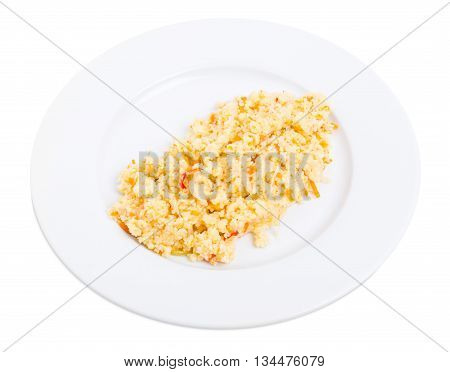 Delicious couscous porridge with tomatoes and onions. Isolated on a white background.