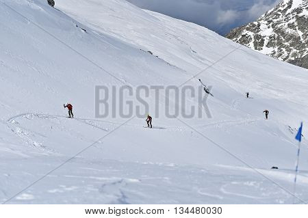 FAGARAS ROMANIA - MARCH 5: Ski mountaineer competes during the Ski Mountaineering National Competition in Fagaras Mountains Carpathian Range on March 5 2016 in Romania.