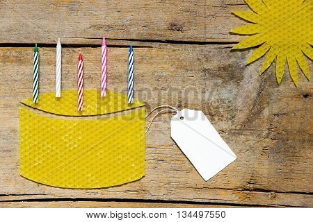 Beeswax, Cake With Candles And Sun On Wooden Table, Empty Sign